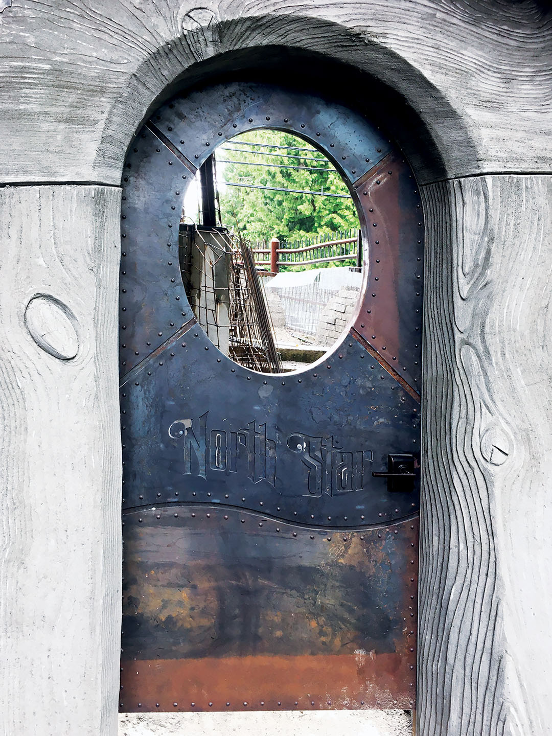 On each garden door the name of the suite will be subtly engraved in some fashion. The North Star suite garden door is fashioned from plasma-cut steel. It will be allowed to acquire a rust patina over time.
